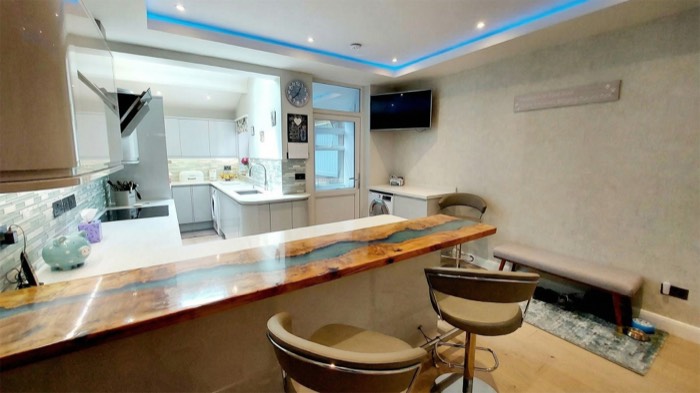 Open-plan kitchen and living area renovation in Benalmadena by Legacy Construction