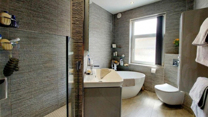 Bathroom renovation with tiling in Marbella by Legacy Construction